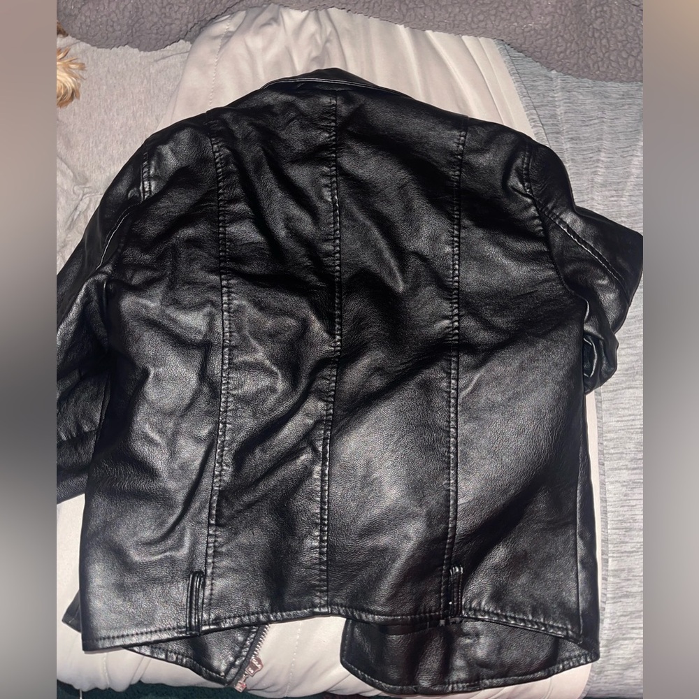 A faux leather jacket basically brand new never worn